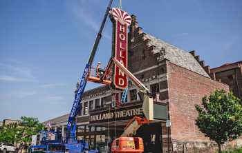 Holland Theatre: Vertical sign installation, late June 2025