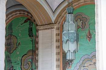 Art Deco murals are a major feature of the exterior ticket lobby and were designed by John Beckman