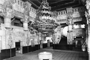 1929 view of the lobby courtesy <i>San Antonio Express-News</i>. Note the sacrificial altar under the chandelier (sold in the 1960s) and the curious bird and birdcage hanging from the wall on the extreme right of the photo (JPG)