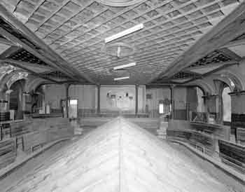 Balcony level as photographed from the Stage in 1998, prior to the removal of the apex-shaped false ceiling separating the main floor from the balcony level, courtesy <i>Historic Environment Scotland</i> (JPG)