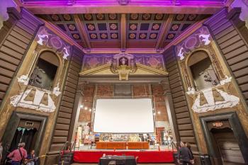 White patches in the proscenium show where decoration was removed to accommodate the CinemaScope projection screen