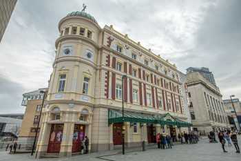 Theatre exterior showing main entrance under dome at left