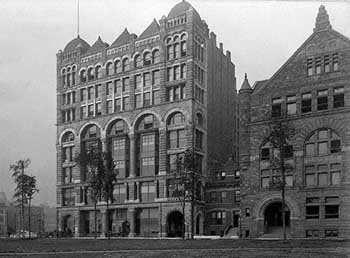 The original Studebaker Building as photographed in 1885.  As part of the remodeling completed in 1898 the top story, complete with roof domes, would be removed, to be replaced with three new stories and a new roof line (JPG)